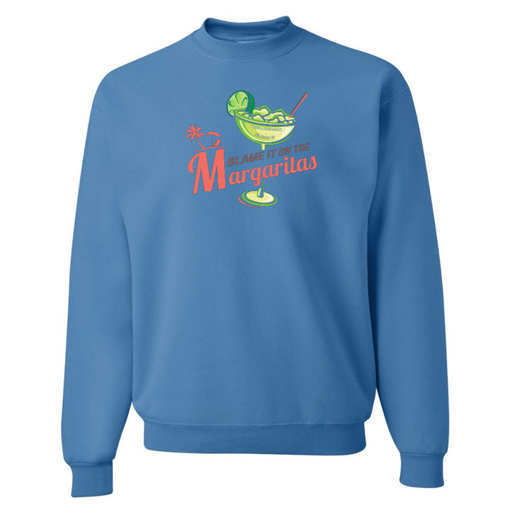 Blue sweatshirt with a margarita graphic and text on a white background