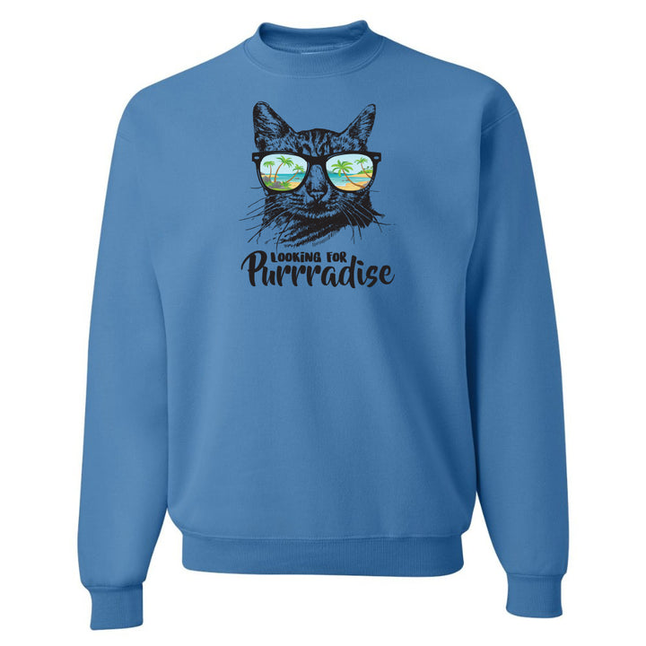 Blue sweatshirt with a cat graphic and text 'Looking for Purradise' on a white background