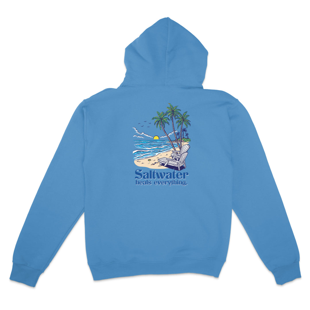 Blue hoodie with a beach graphic and 'Saltwater heals everything' text on the back, on a white background.