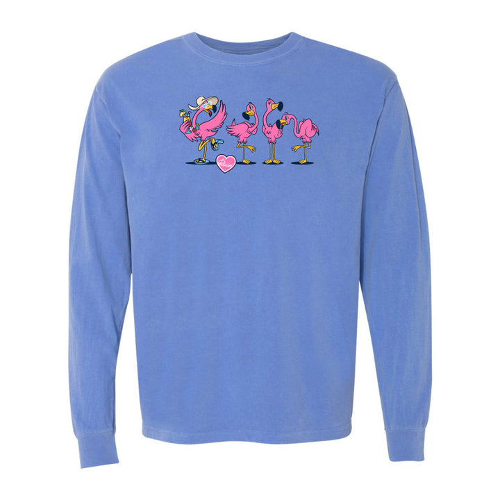 Blue long-sleeve shirt with pink flamingo design on a white background