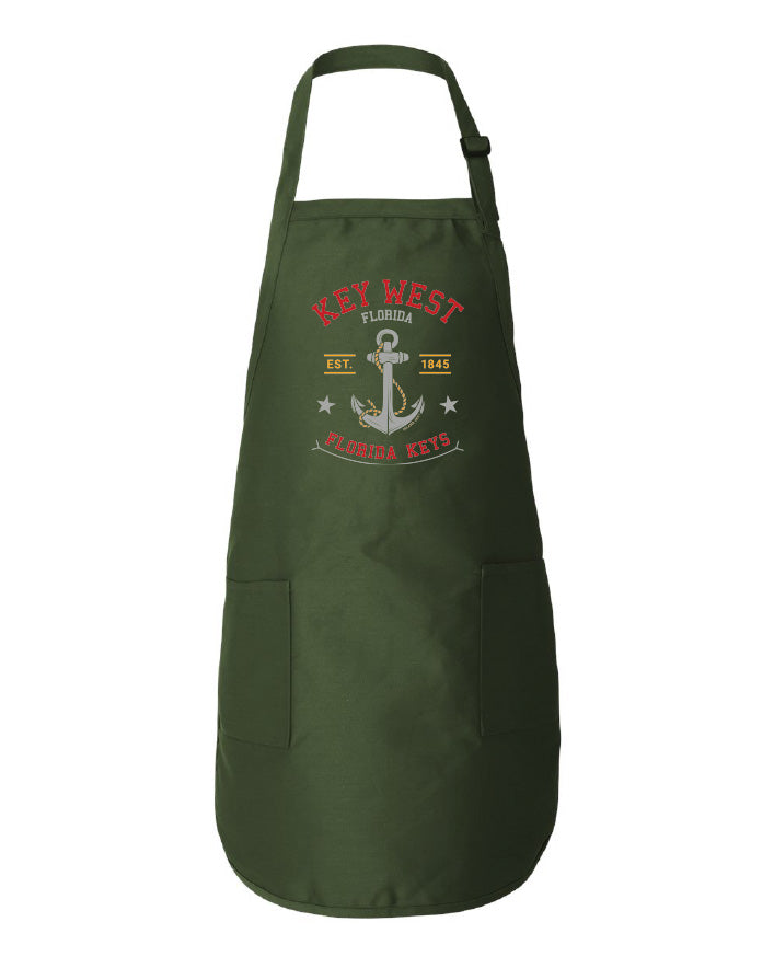 Green apron with Key West Florida design on a white background