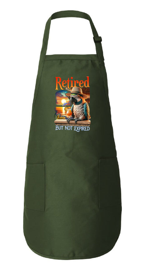 Green apron with a retirement-themed design on a white background
