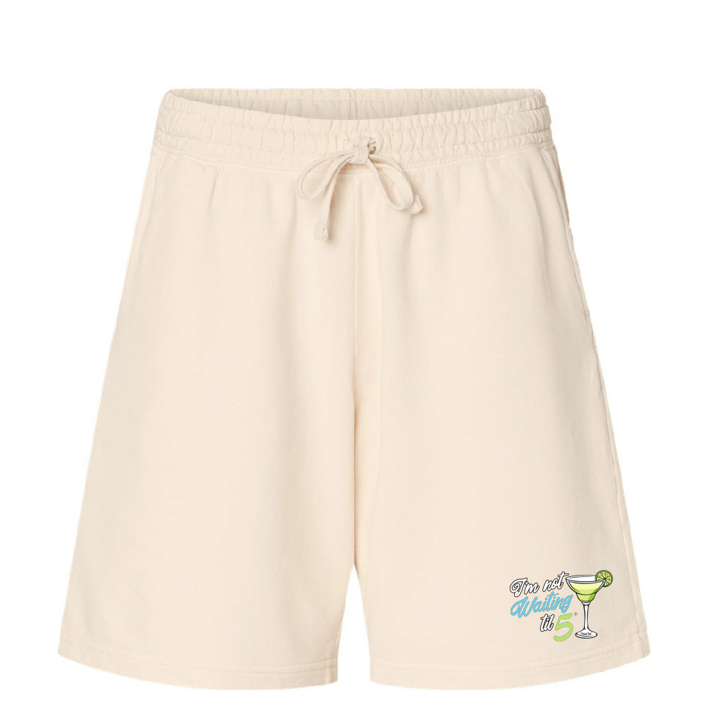 Beige shorts with a graphic design on a white background