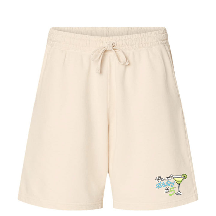 Beige shorts with a graphic design on a white background