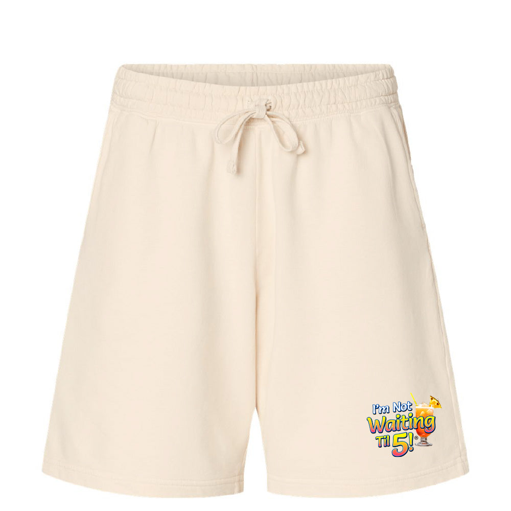 Beige shorts with a colorful graphic on a white background