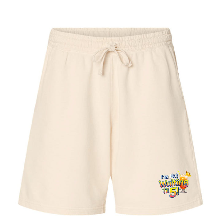 Beige shorts with a colorful graphic on a white background