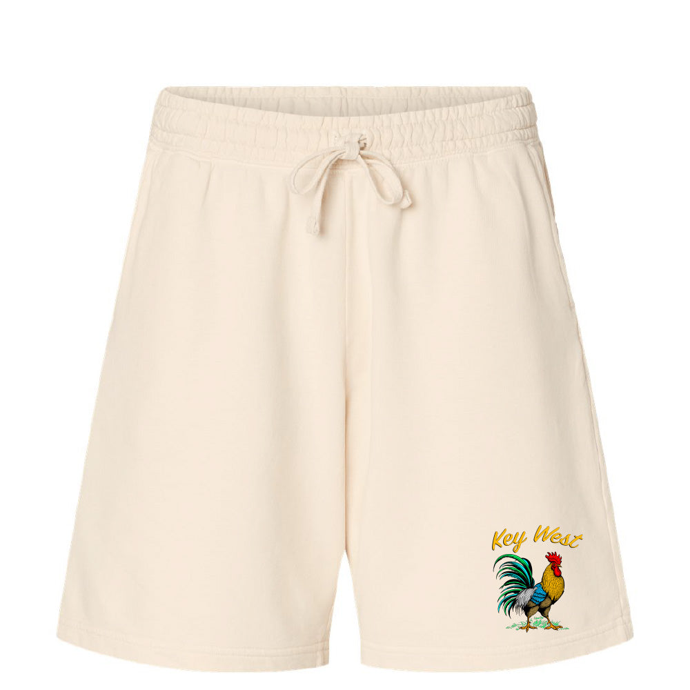 Beige shorts with a rooster design and 'Key West' text on a white background