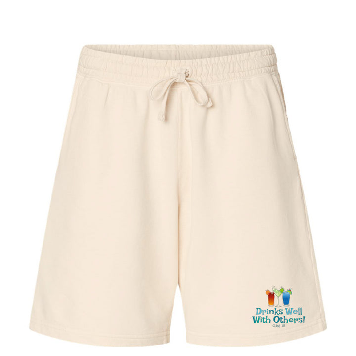 Beige shorts with a colorful graphic and text on a white background