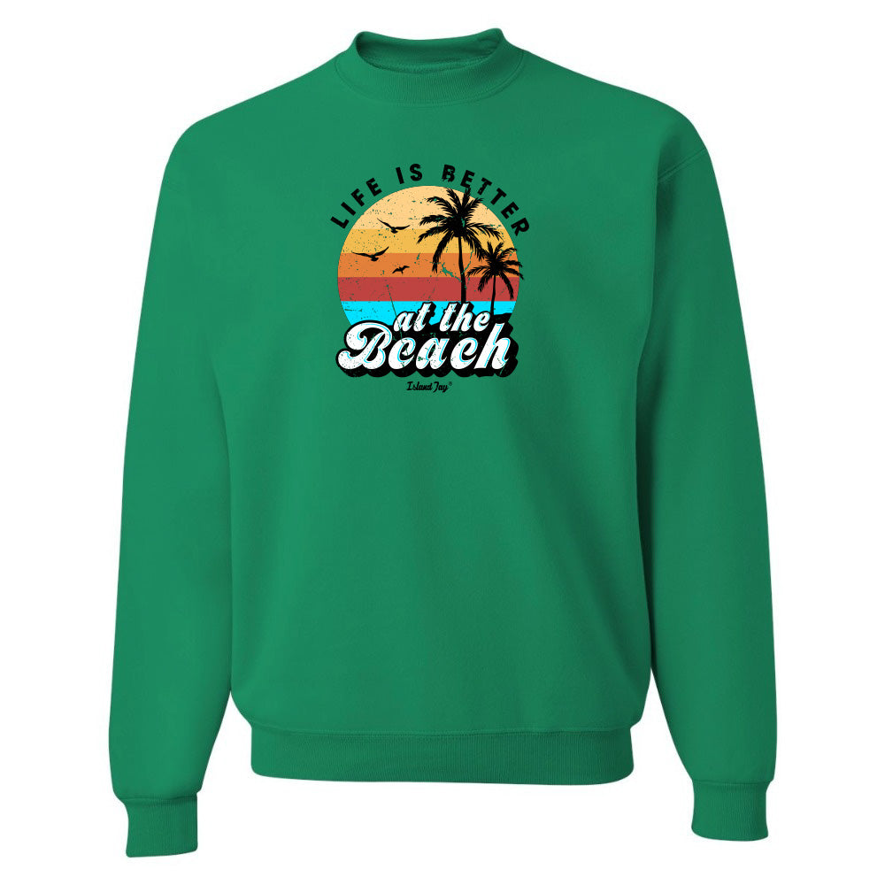 Green sweatshirt with 'Life is Better at the Beach' graphic on a white background