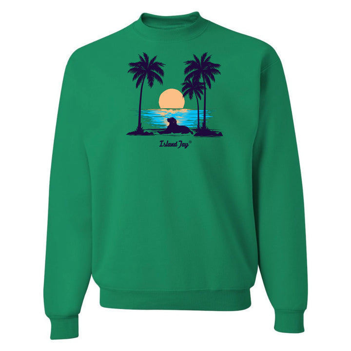 Green sweatshirt with a tropical design featuring palm trees and a sunset on a white background