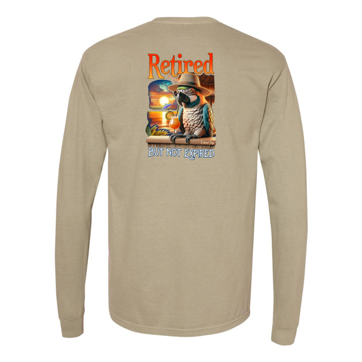 Beige long-sleeve shirt with a parrot graphic and 'Retired but not expired' text on the back.