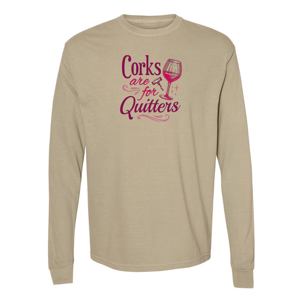 Beige long-sleeve shirt with pink text and wine glass graphic on a white background
