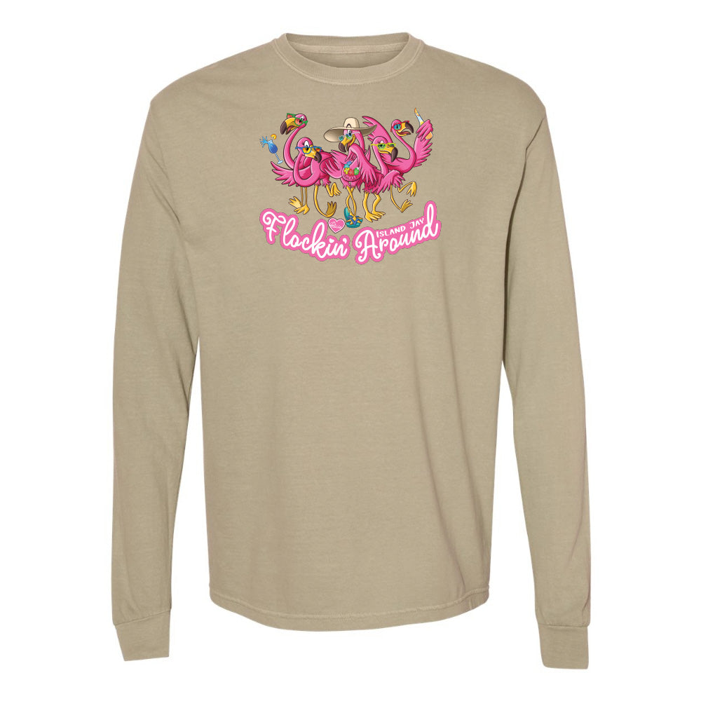 Beige long-sleeve shirt with pink flamingo design and text on a white background