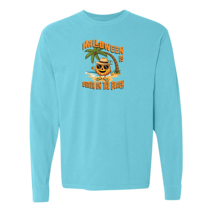 Light blue long-sleeve shirt with Halloween design featuring a palm tree and pumpkin on a white background