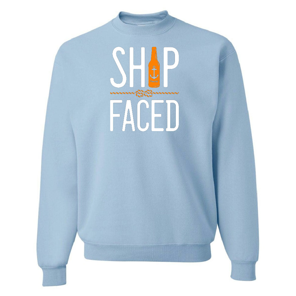 Light blue sweatshirt with 'SHIP FACED' text and bottle graphic on a white background