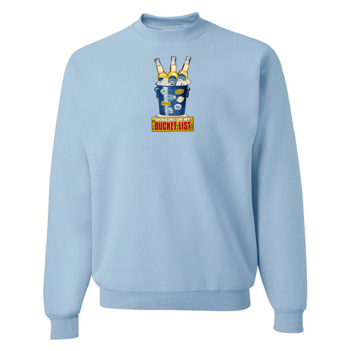 Light blue sweatshirt with a graphic design on a white background