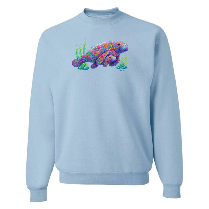 Light blue sweatshirt with a colorful sea turtle design on a white background