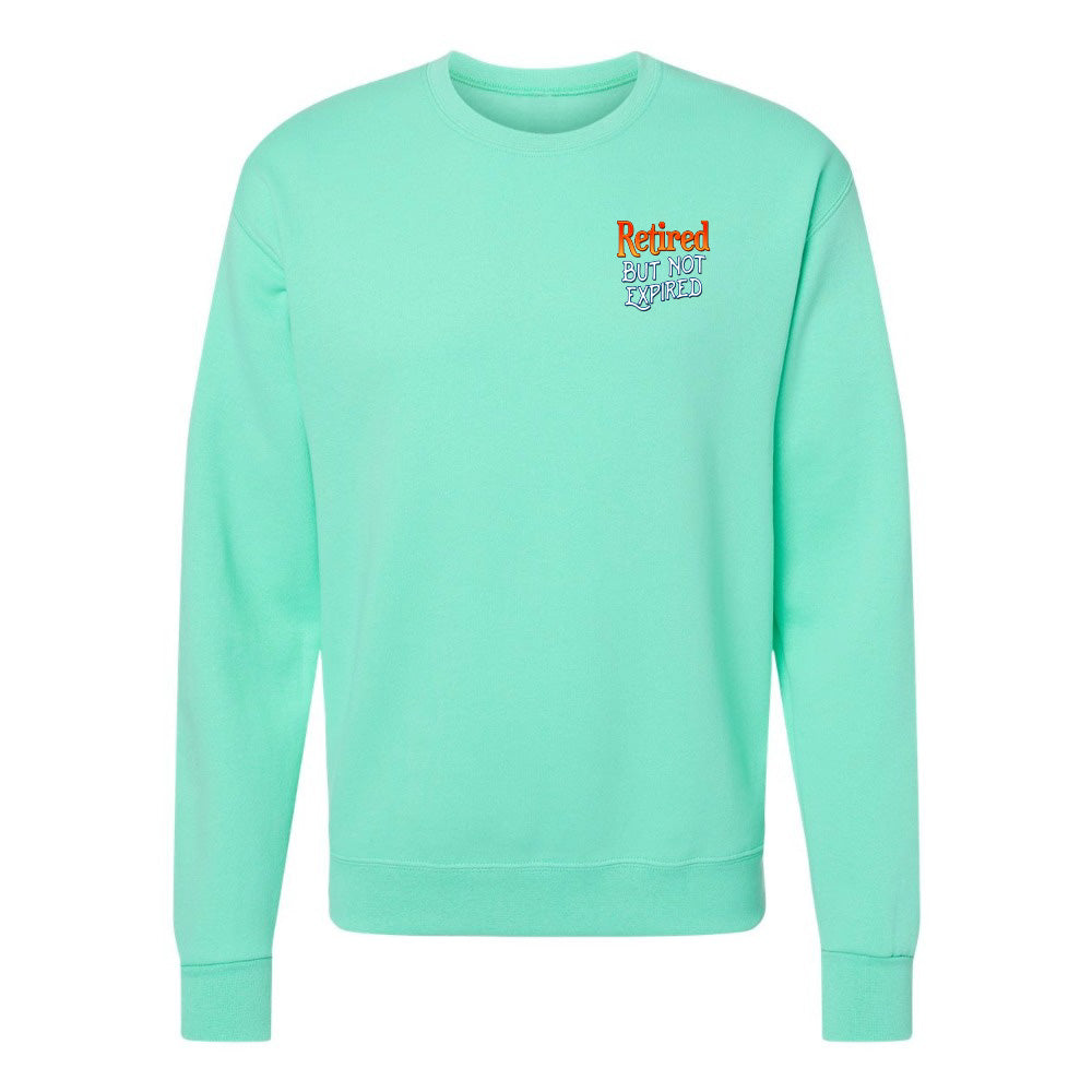 Mint green sweatshirt with colorful text on a white background