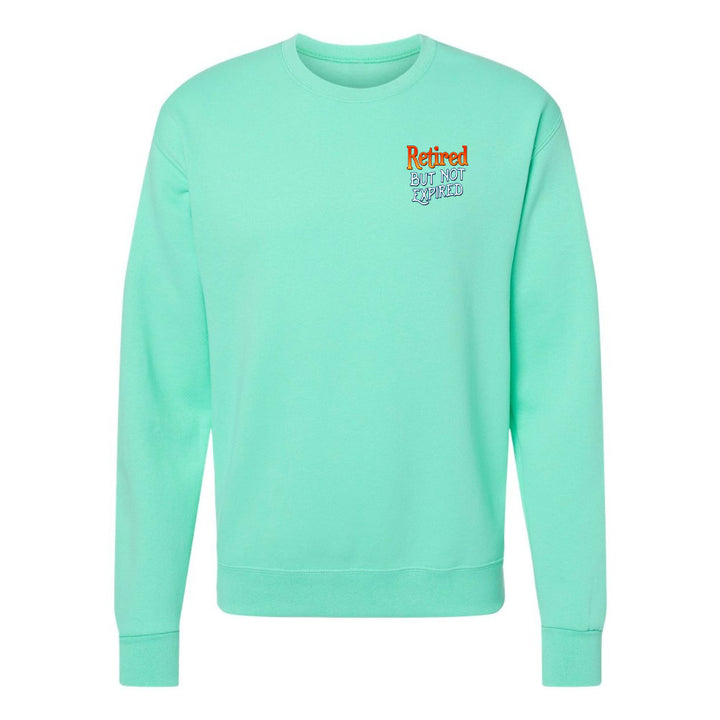 Mint green sweatshirt with colorful text on a white background