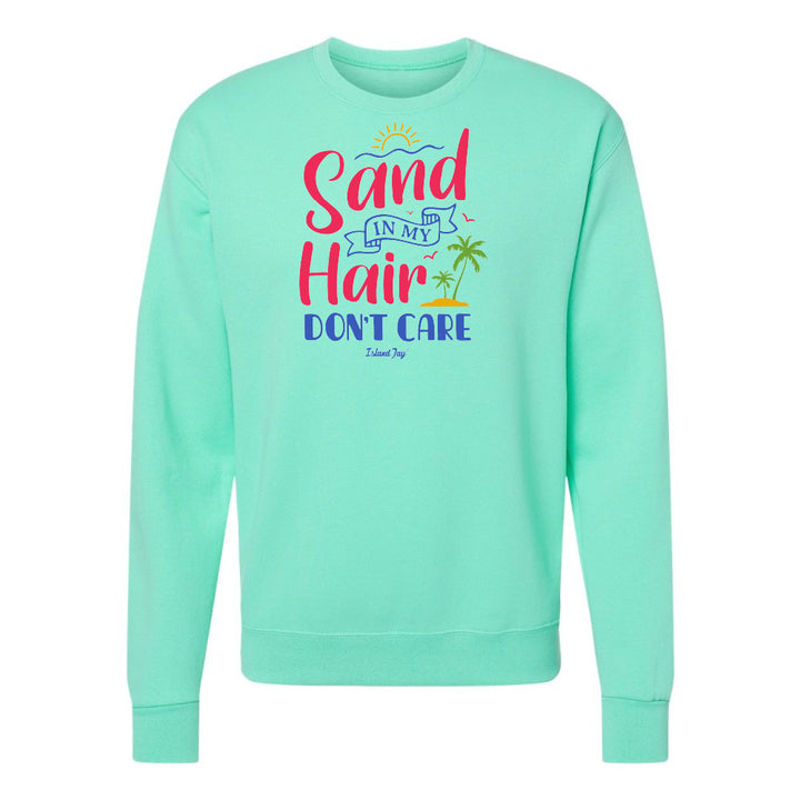 Mint green sweatshirt with colorful text design on a white background