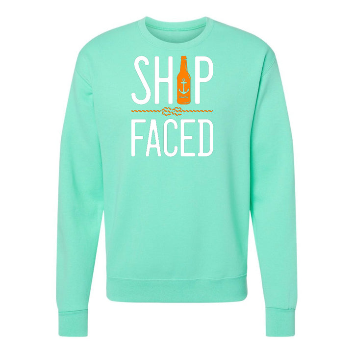 Mint green sweatshirt with 'Ship Faced' text and bottle graphic on a white background
