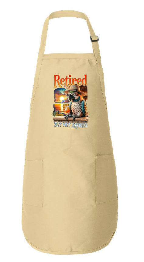 Beige apron with a graphic design featuring a parrot and "Retired But Not Expired"