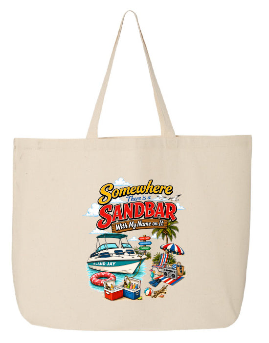 A beige canvas tote bag with a colorful graphic print that reads 'Somewhere There Is a SANDBAR With My Name on It' above a beach scene with a boat, palm tree, and lounge chairs.