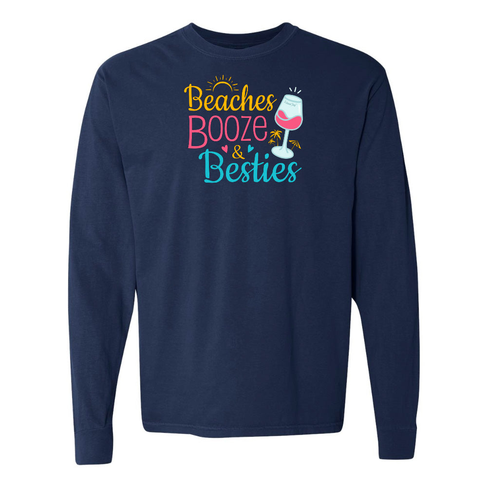 Navy blue long-sleeve shirt with 'Beaches Booze & Besties' text and graphics on a white background