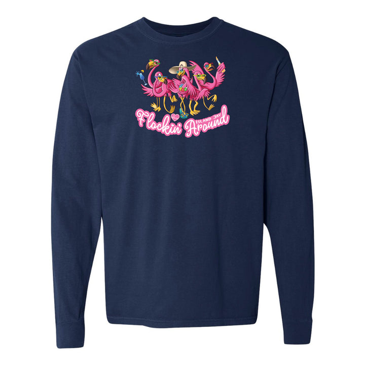 Navy blue long-sleeve shirt with pink flamingo design and text on a white background