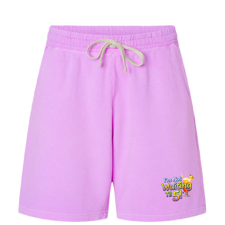 Purple shorts with a graphic design on a white background