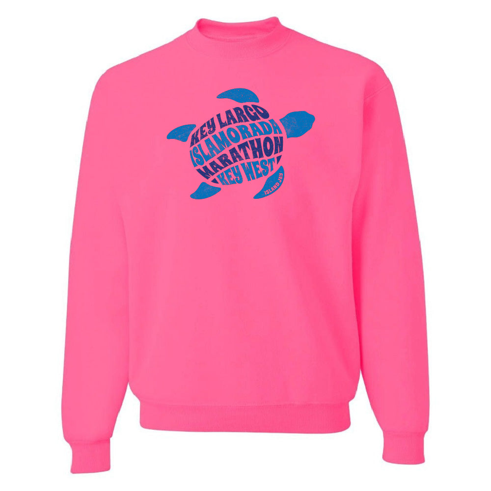 Pink sweatshirt with blue turtle graphic and text on a white background