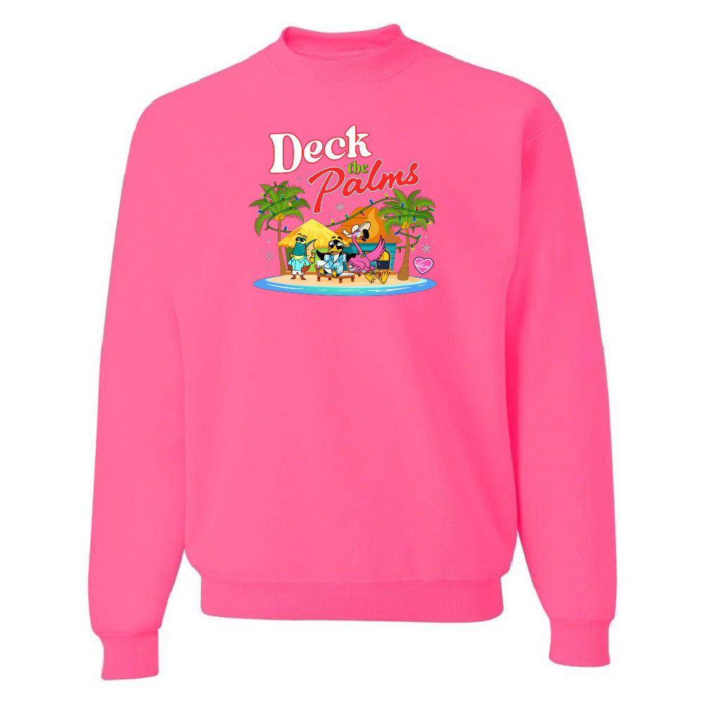 Pink sweatshirt with 'Dock Palms' design on a white background