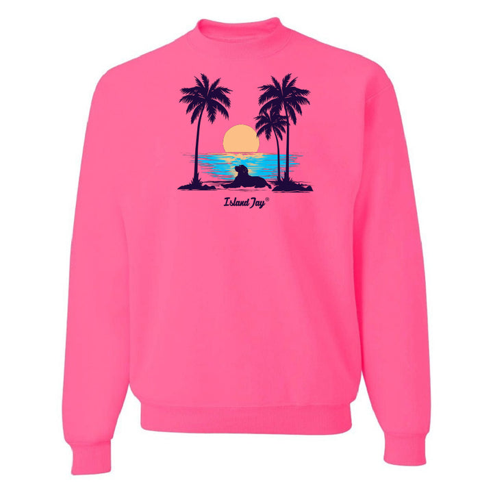 Pink sweatshirt with a tropical graphic of palm trees and a sunset on a white background