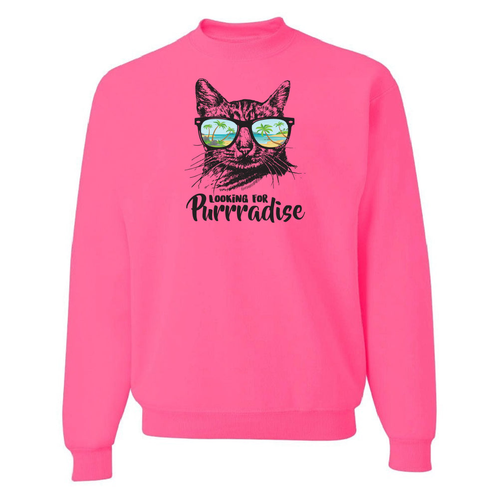 Pink sweatshirt with a cat graphic and text 'Looking for Purradise' on a white background