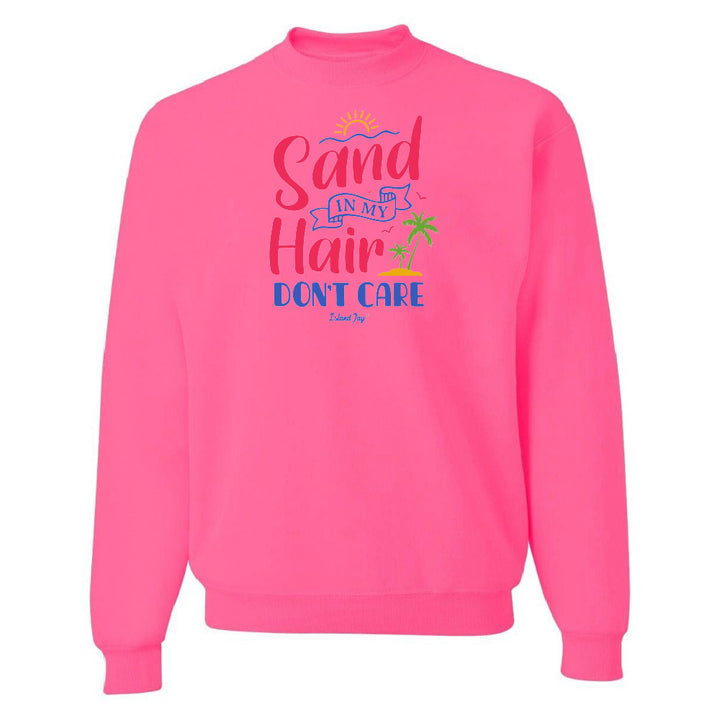 Pink sweatshirt with 'Sand in My Hair Don't Care' text and graphics on a white background