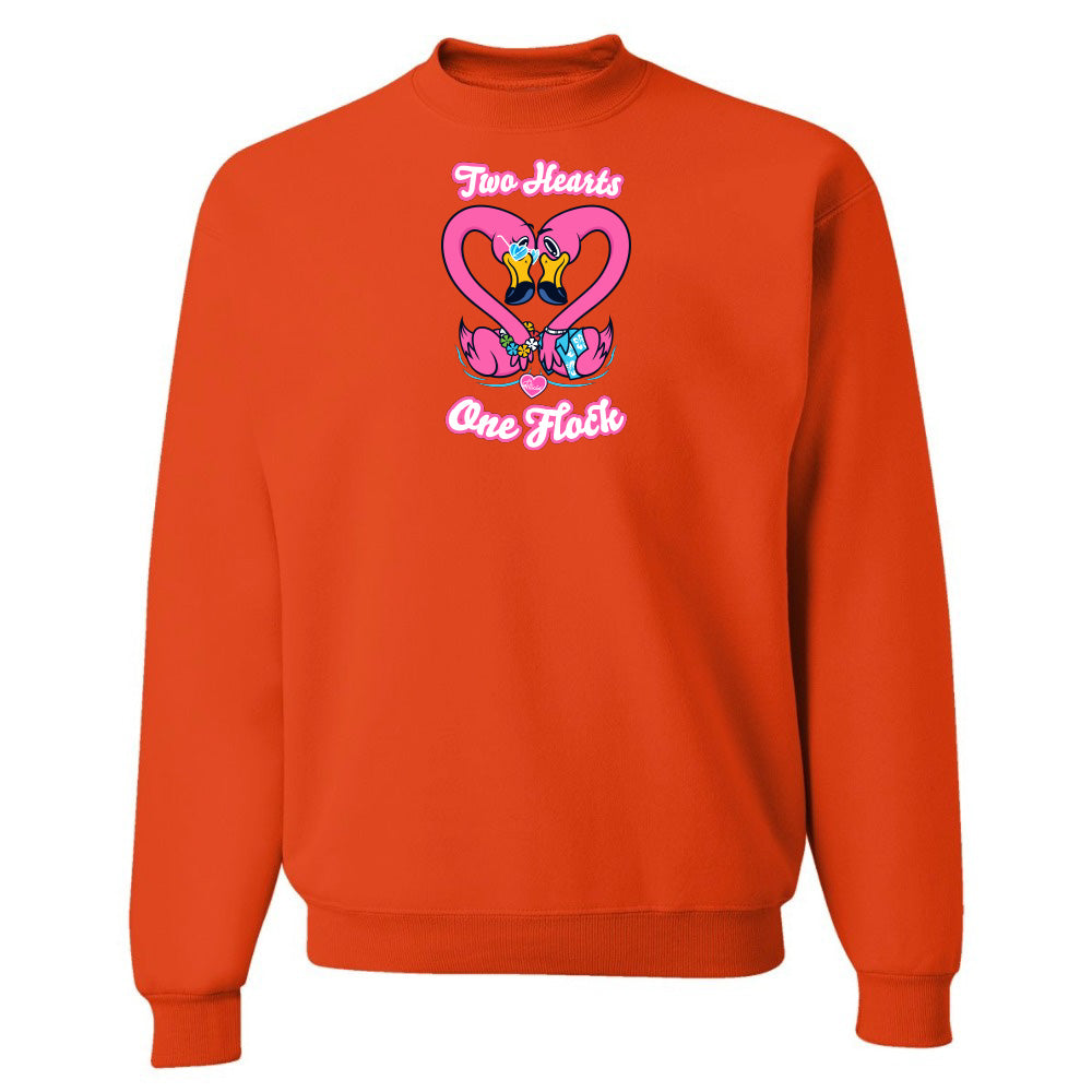 Orange sweatshirt with a colorful graphic and text on a white background
