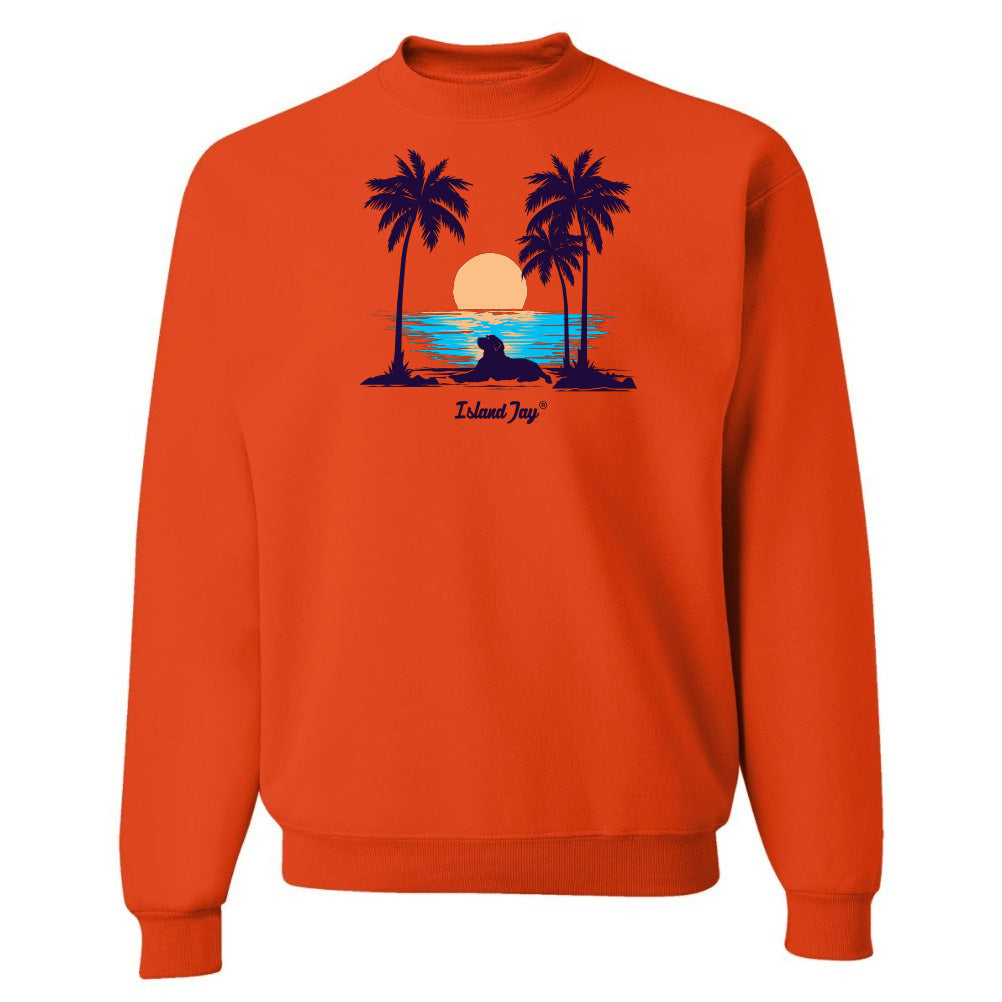 Orange sweatshirt with a graphic of palm trees and a sunset on a white background