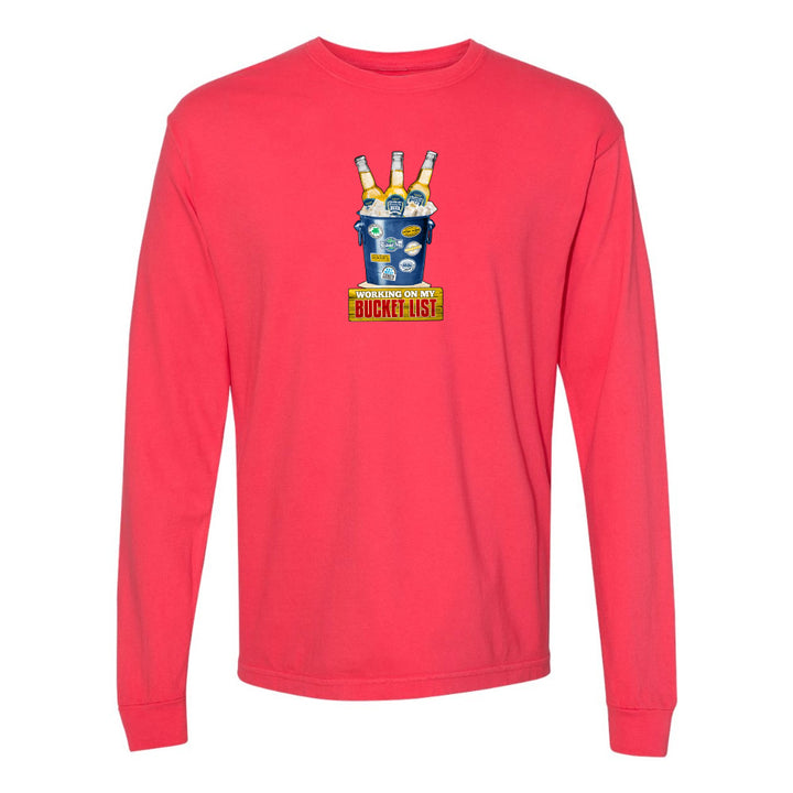 Red long-sleeve shirt with a graphic design on a white background