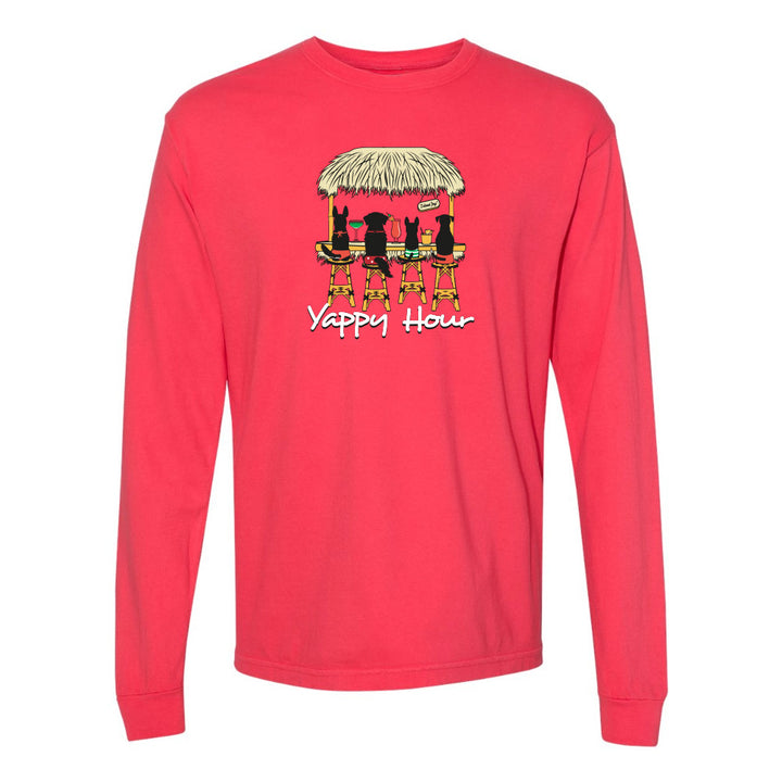 Red long-sleeve shirt with a graphic of two dogs under a thatched roof and 'Yappy Hour' text on a white background.
