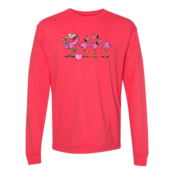 Red long-sleeve shirt with cartoon flamingos design on a white background