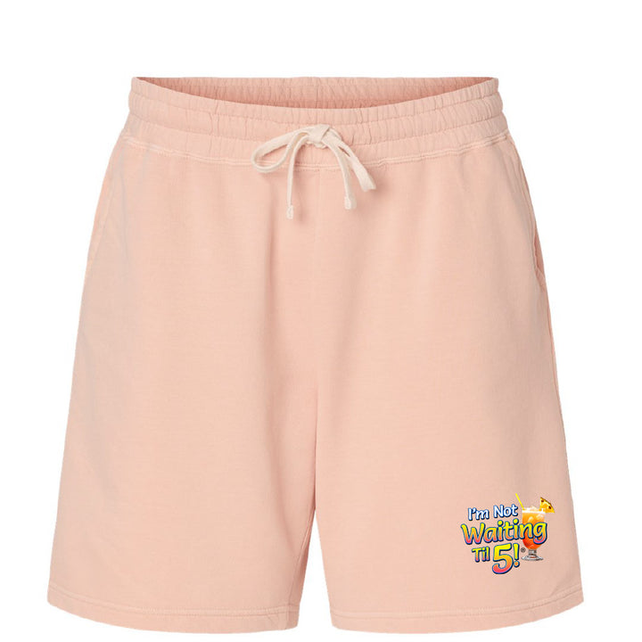 Pink shorts with a colorful graphic on a white background