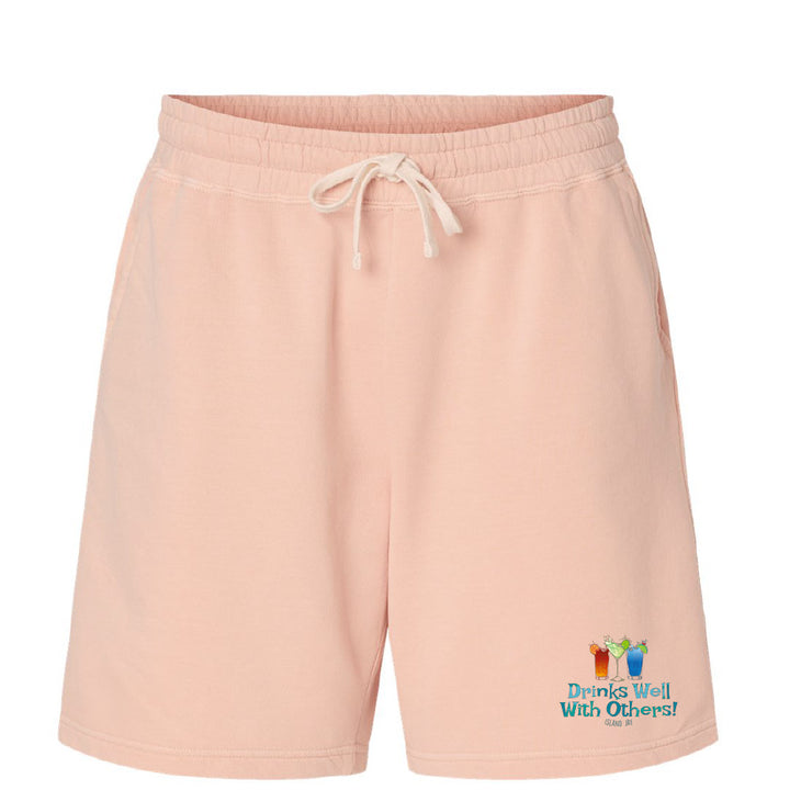 Pink shorts with a colorful graphic and text on a white background