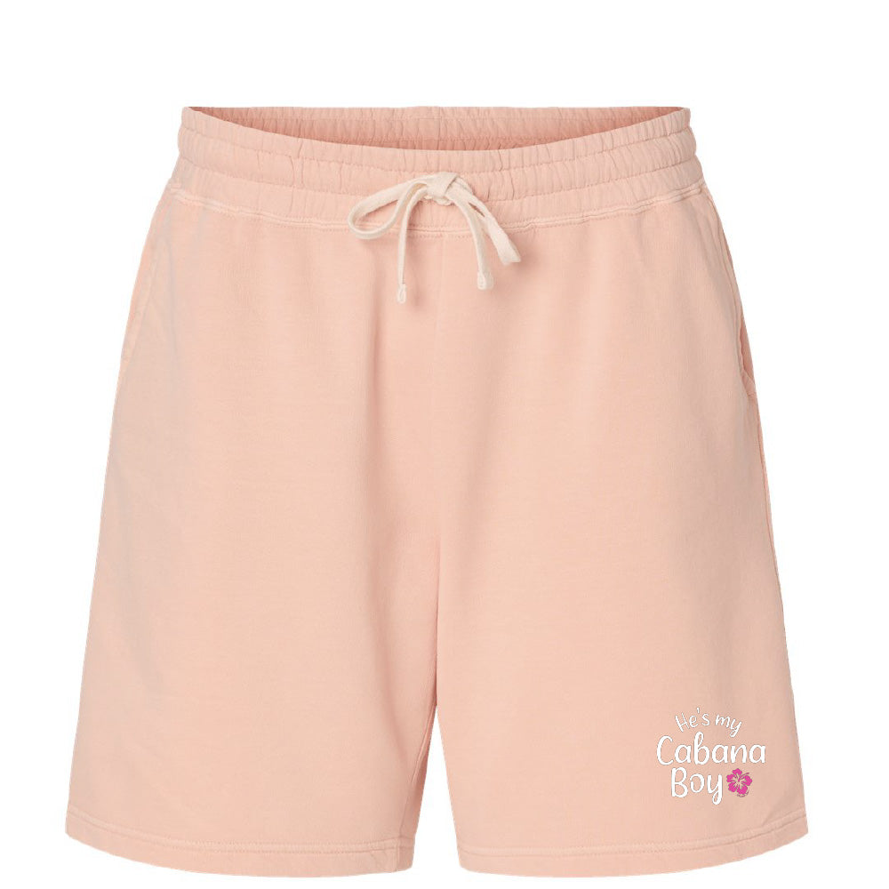 Pink shorts with a drawstring on a white background