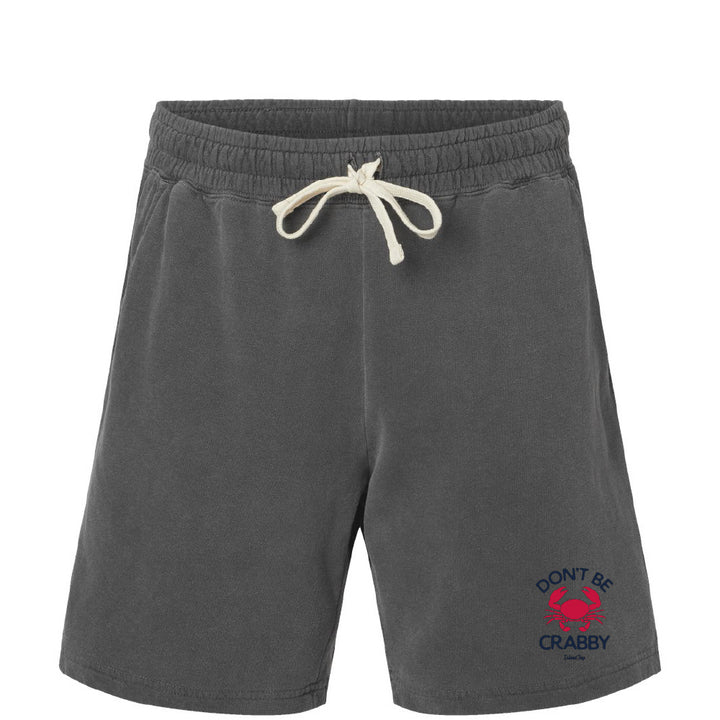 Gray shorts with a red crab graphic and 'Don't Be Crabby' text on a white background