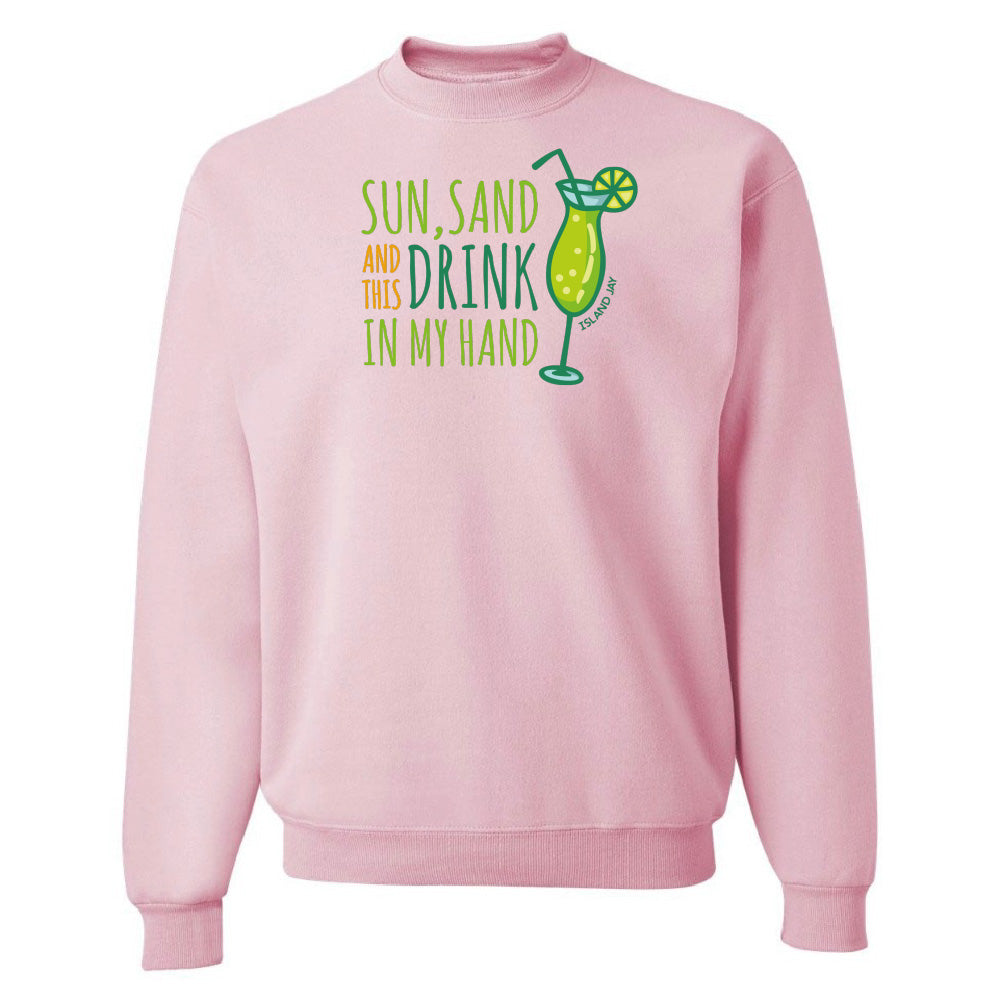 Pink sweatshirt with a graphic and text 'Sun, Sand and Drink in My Hand' on a white background