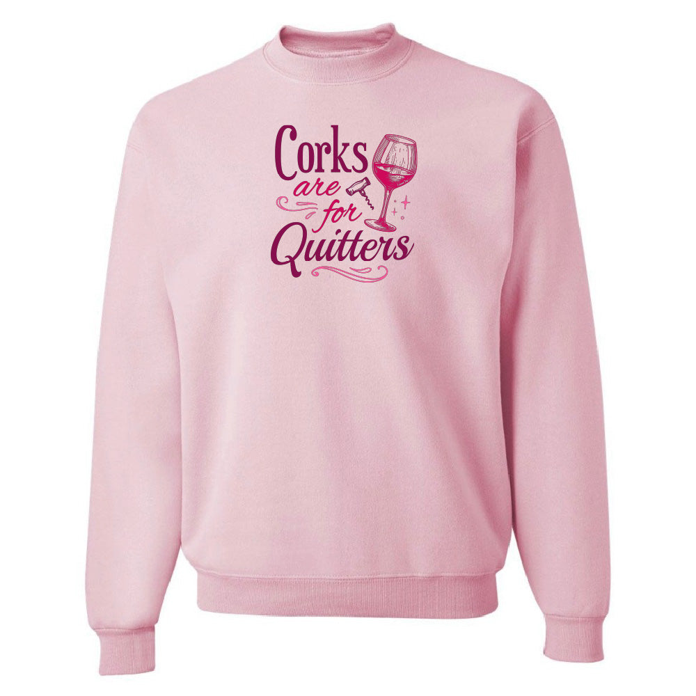 Pink sweatshirt with text 'Corks are for Quitters' on a white background