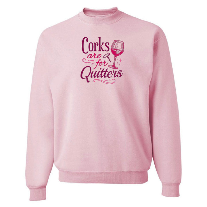 Pink sweatshirt with text 'Corks are for Quitters' on a white background