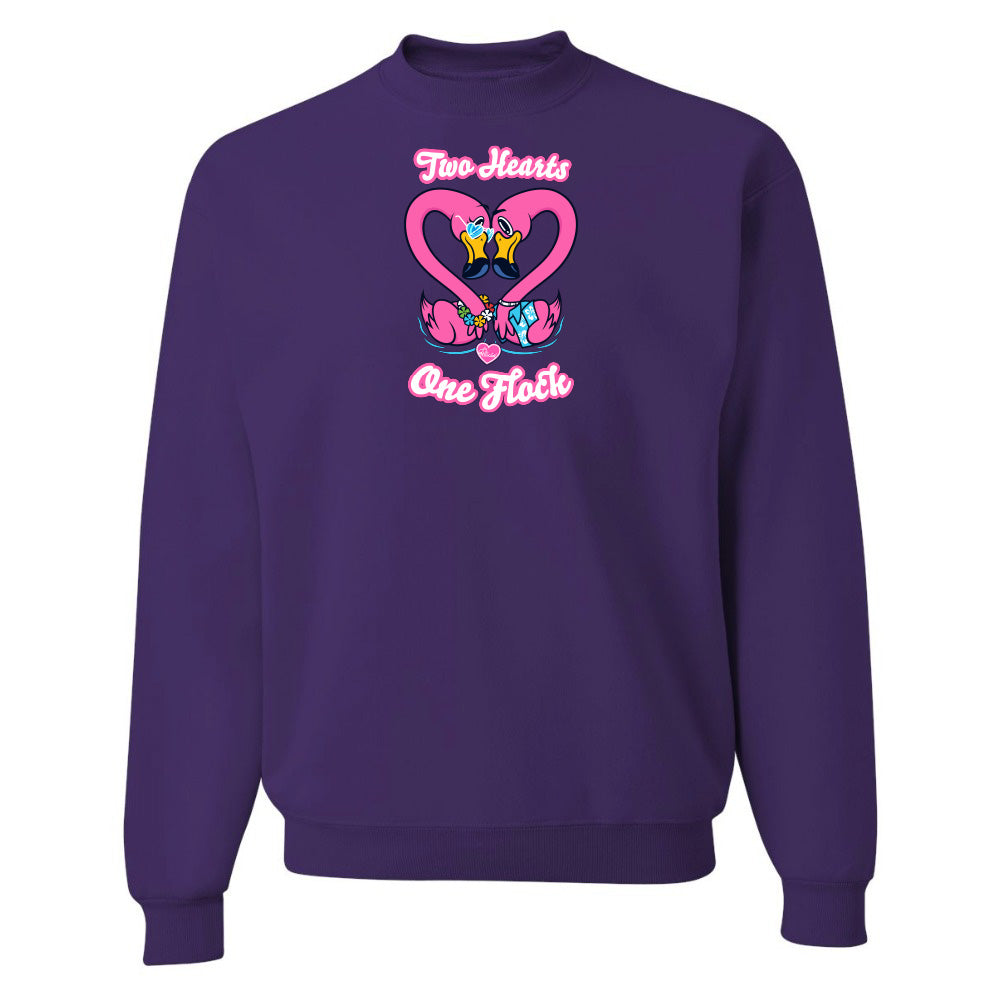 Purple sweatshirt with a heart design and text on a white background