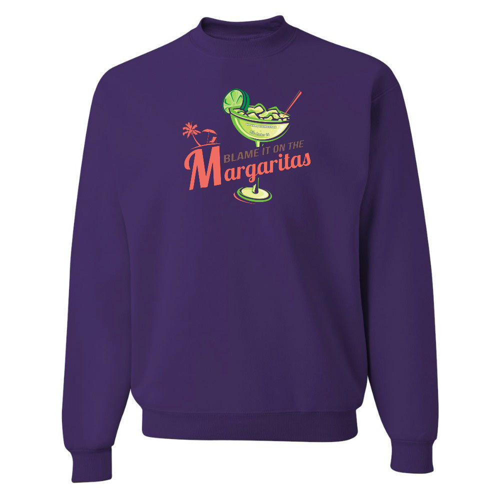Purple sweatshirt with a graphic design and text on a white background