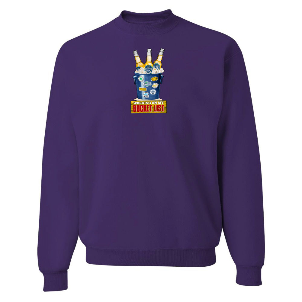 Purple sweatshirt with a colorful graphic design on a white background